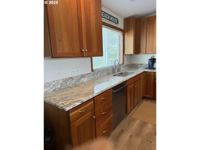 a kitchen with a sink and a cabinets