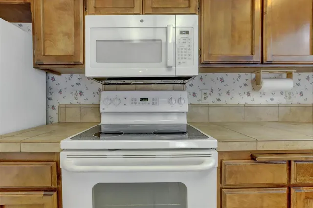 an empty room with closet area