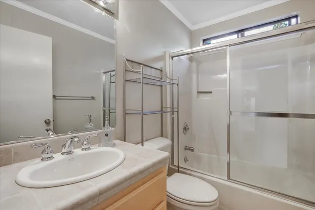 a front view of a house with parking area