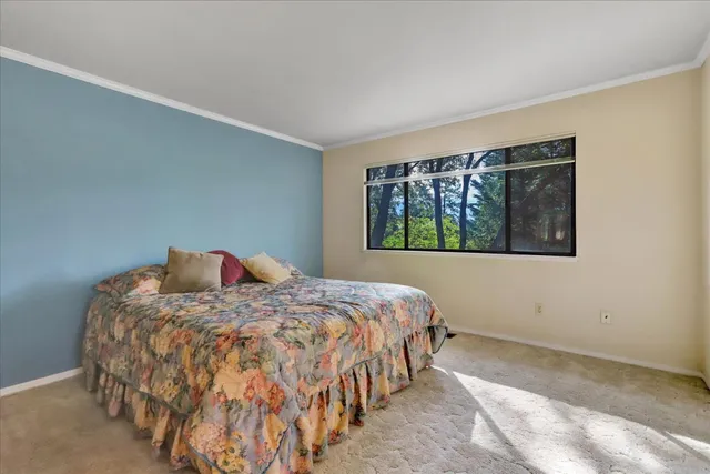 a view of balcony with wooden floor
