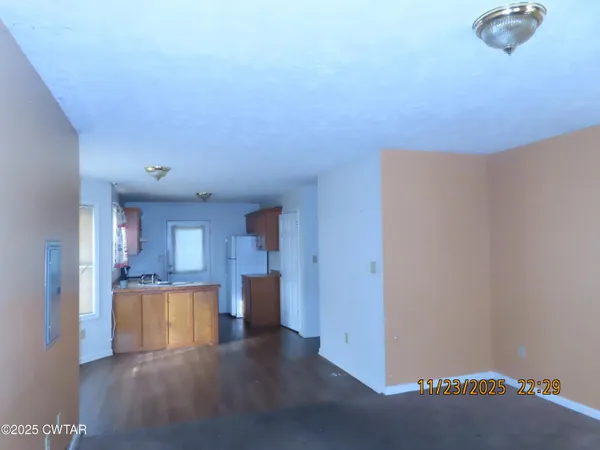 a view of a kitchen with a sink