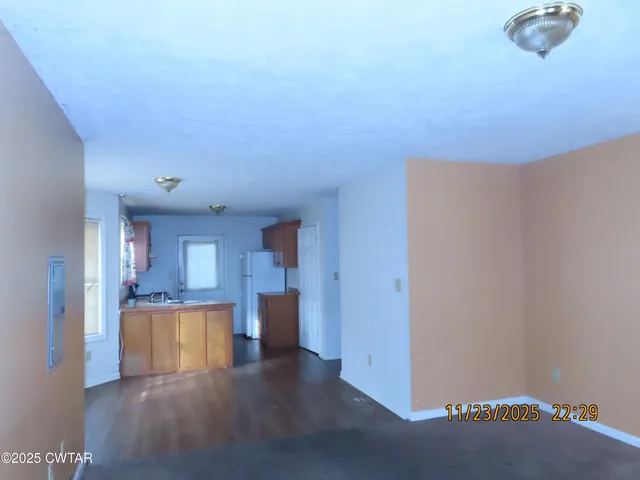 a view of a kitchen with a sink