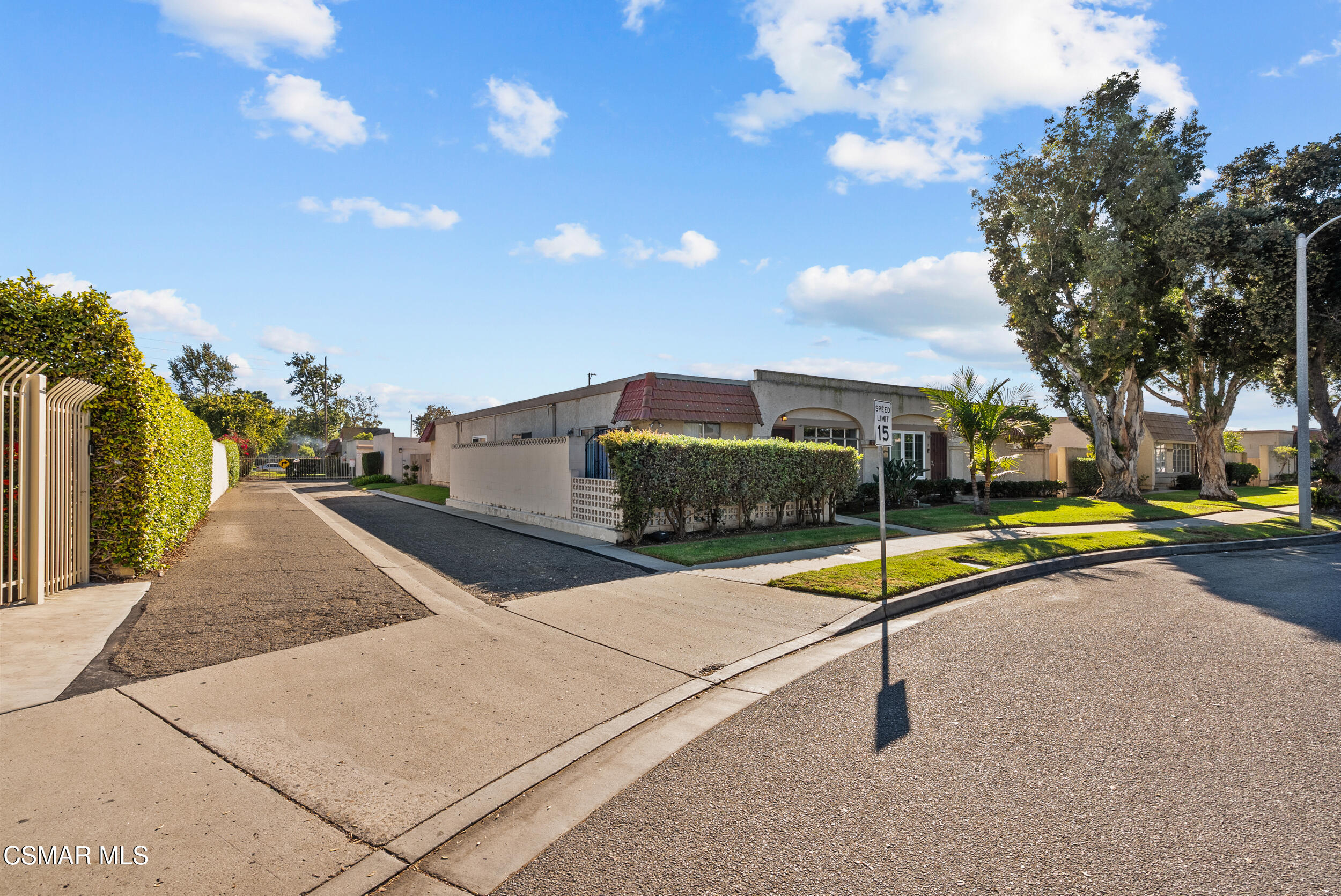 2930 Isle Way, Unit B Oxnard, CA 93035 - Photo 1 of 35 a view of a swimming pool with a bench and some trees
