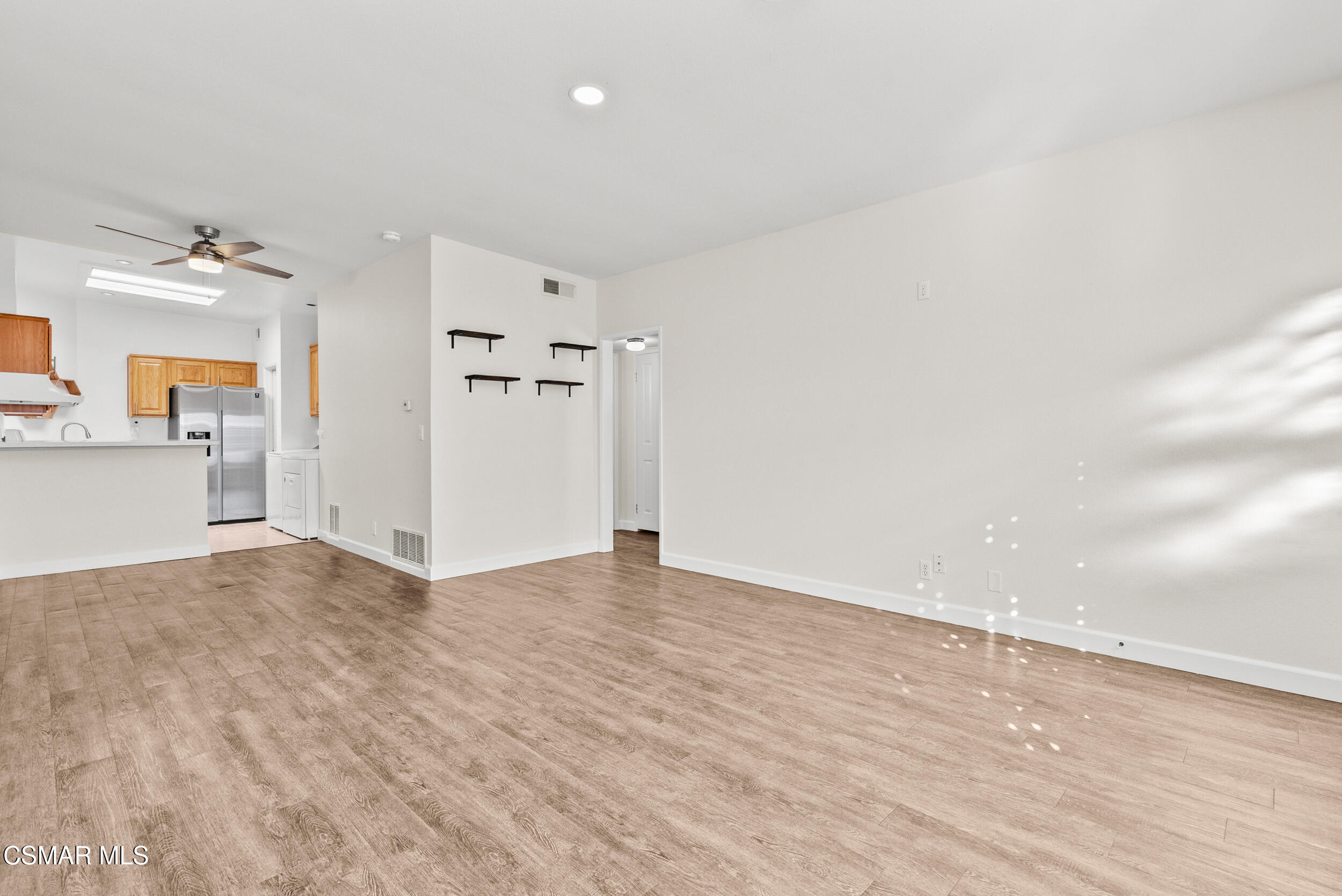 2930 Isle Way, Unit B Oxnard, CA 93035 - Photo 11 of 35 a view of empty room with wooden floor