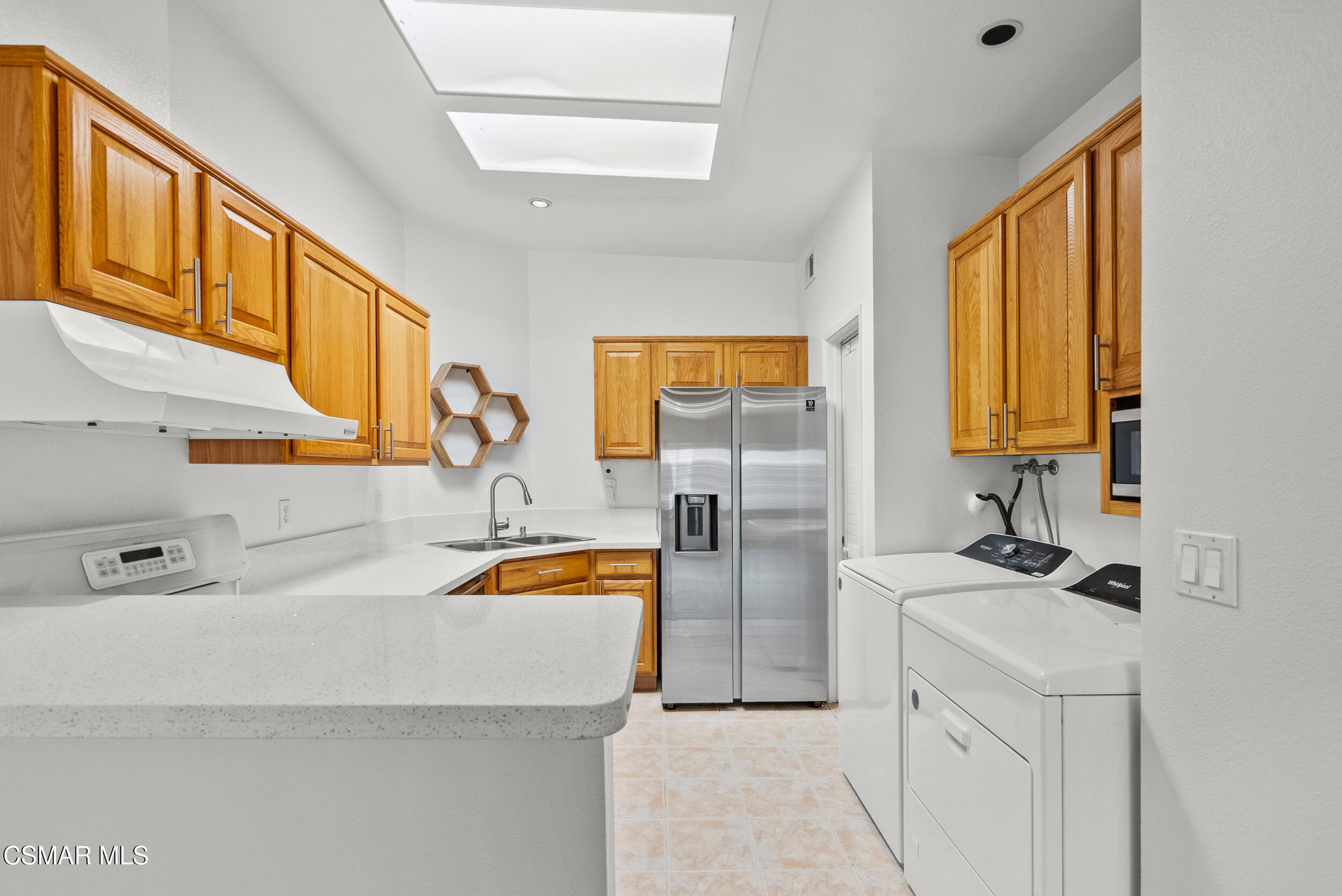 2930 Isle Way, Unit B Oxnard, CA 93035 - Photo 14 of 35 a bathroom with a sink and a mirror
