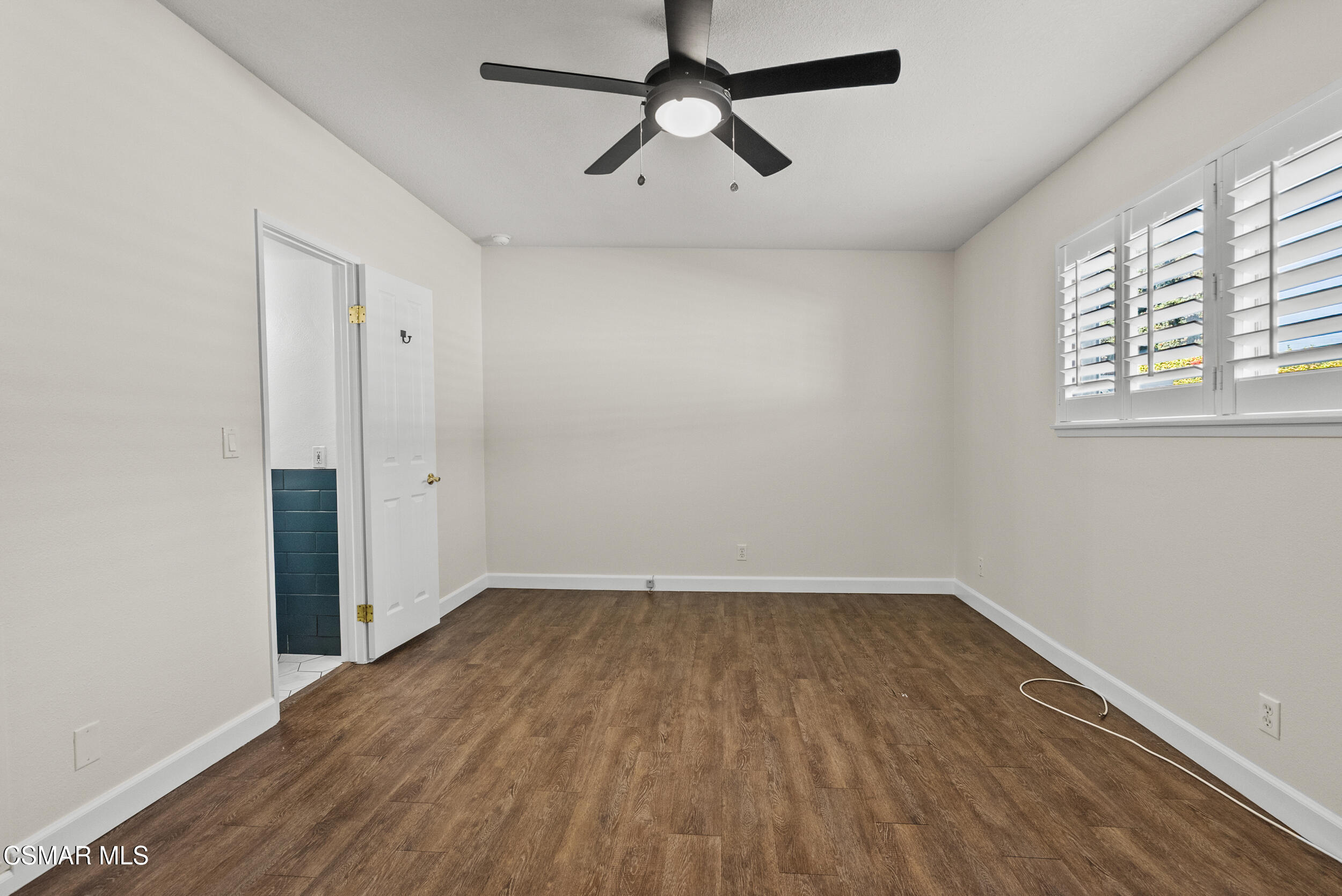 2930 Isle Way, Unit B Oxnard, CA 93035 - Photo 23 of 35 wooden floor in an empty room with a window