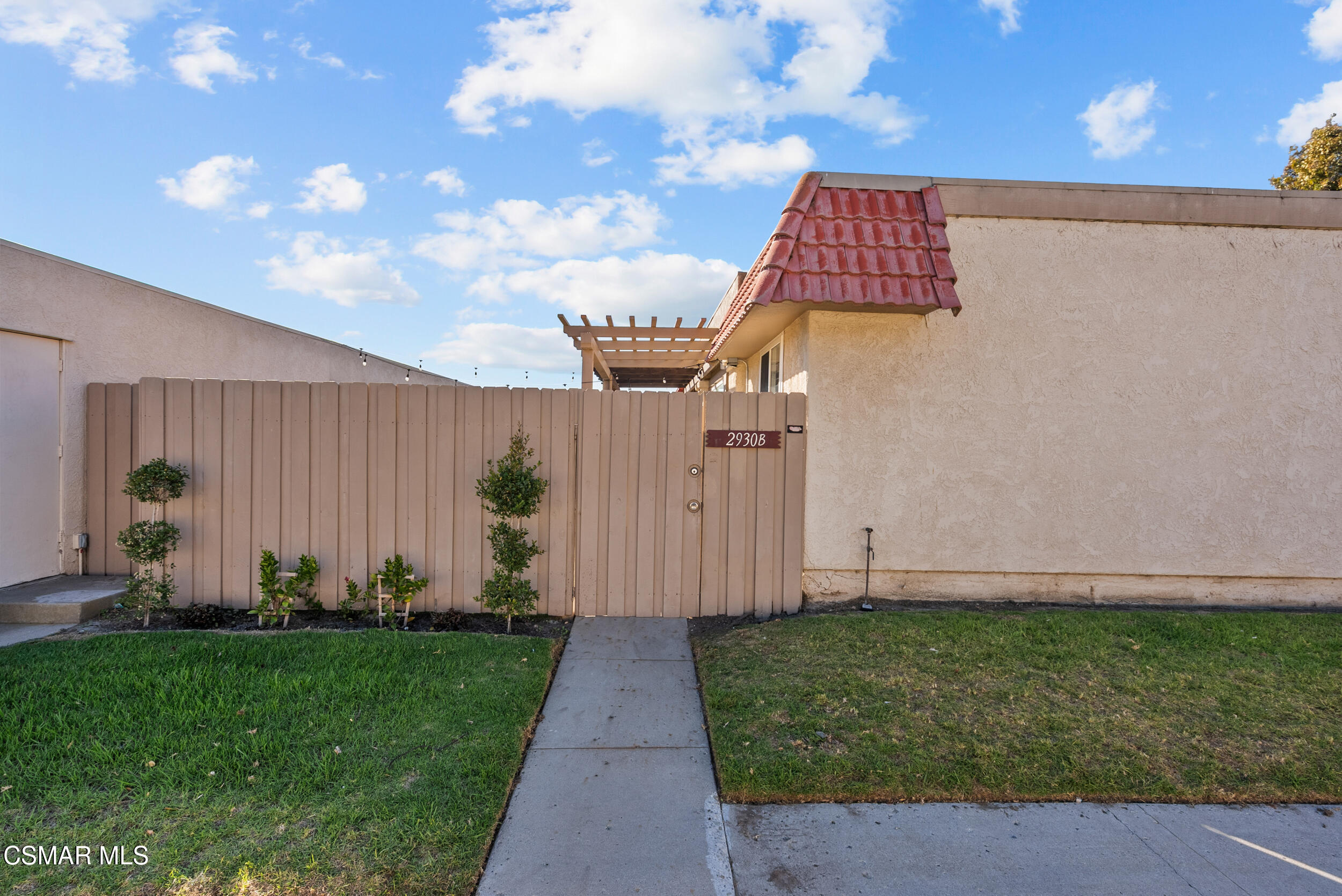 2930 Isle Way, Unit B Oxnard, CA 93035 - Photo 3 of 35 a view of a back yard of the house