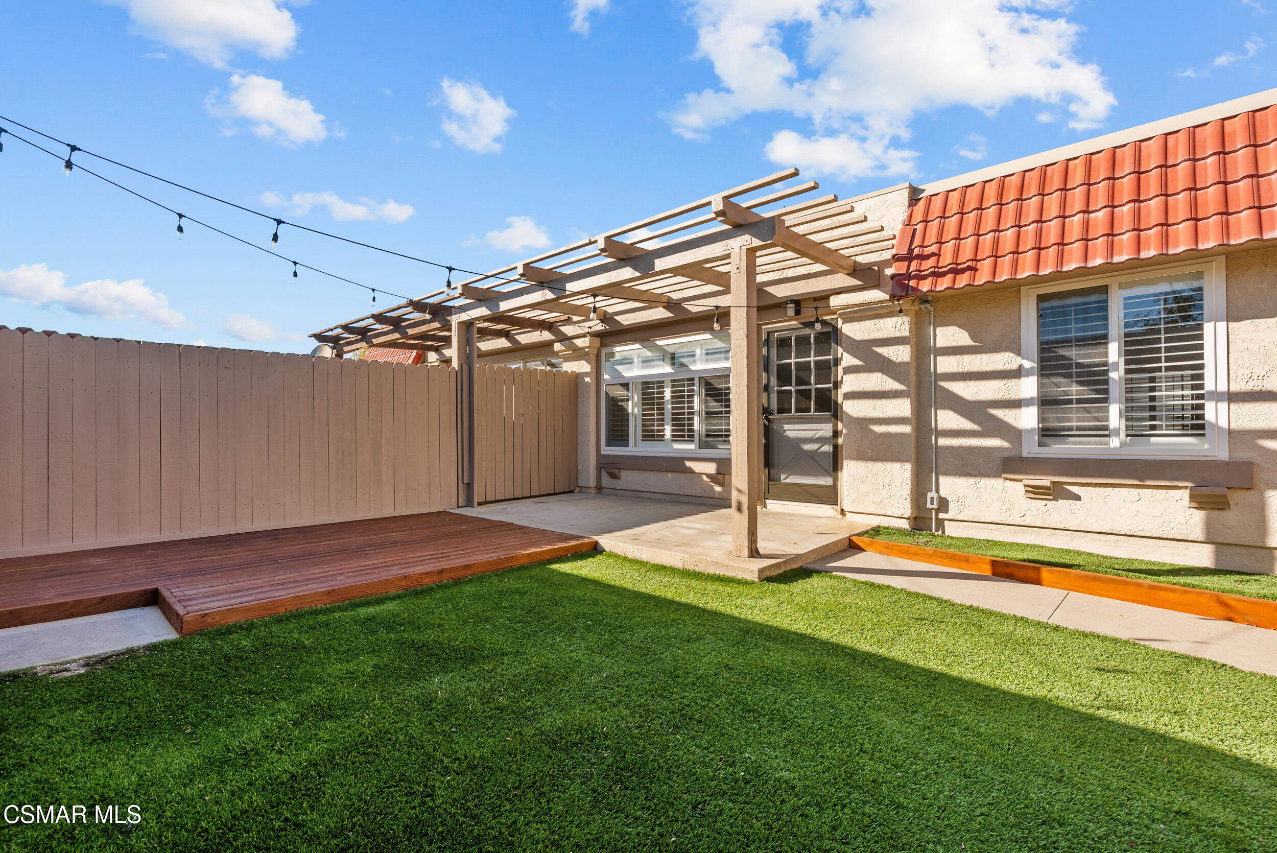 2930 Isle Way, Unit B Oxnard, CA 93035 - Photo 7 of 35 a view of an house with backyard and a patio