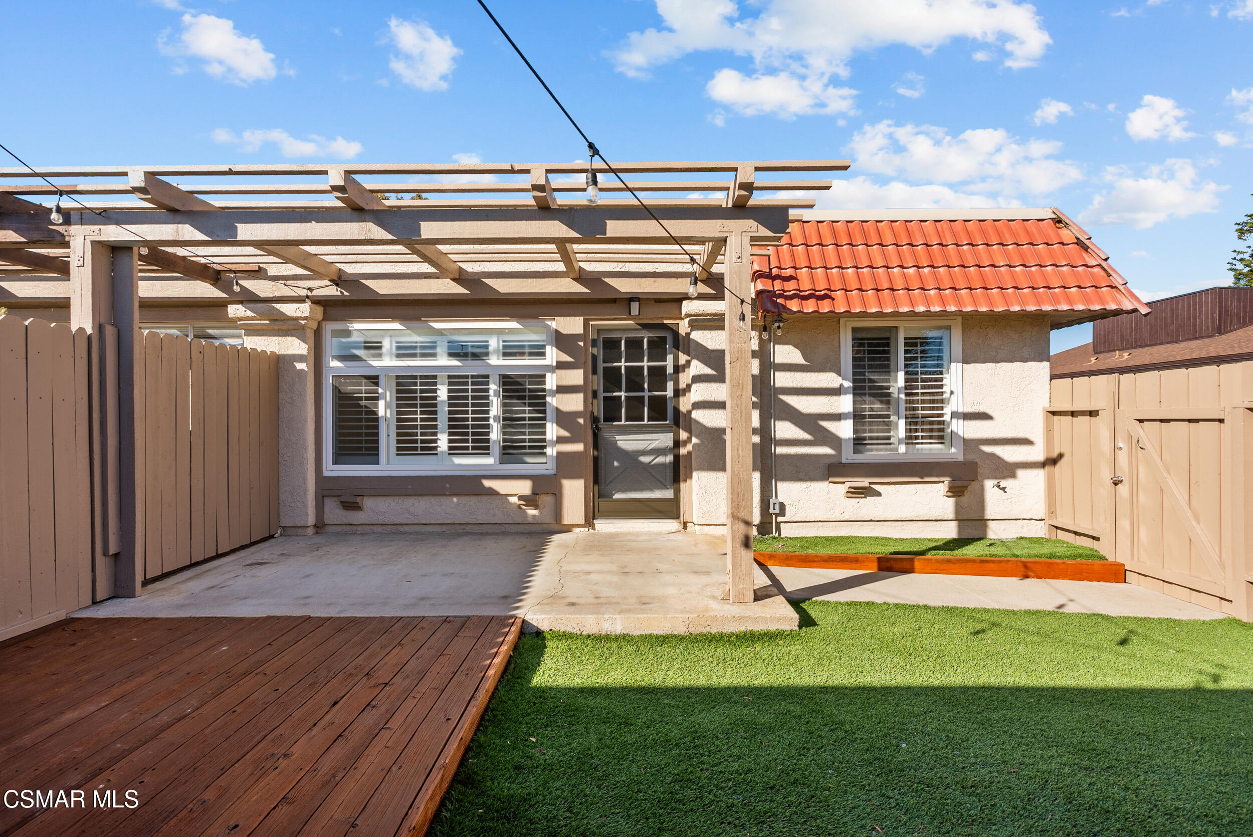 2930 Isle Way, Unit B Oxnard, CA 93035 - Photo 8 of 35 a view of a backyard with a patio