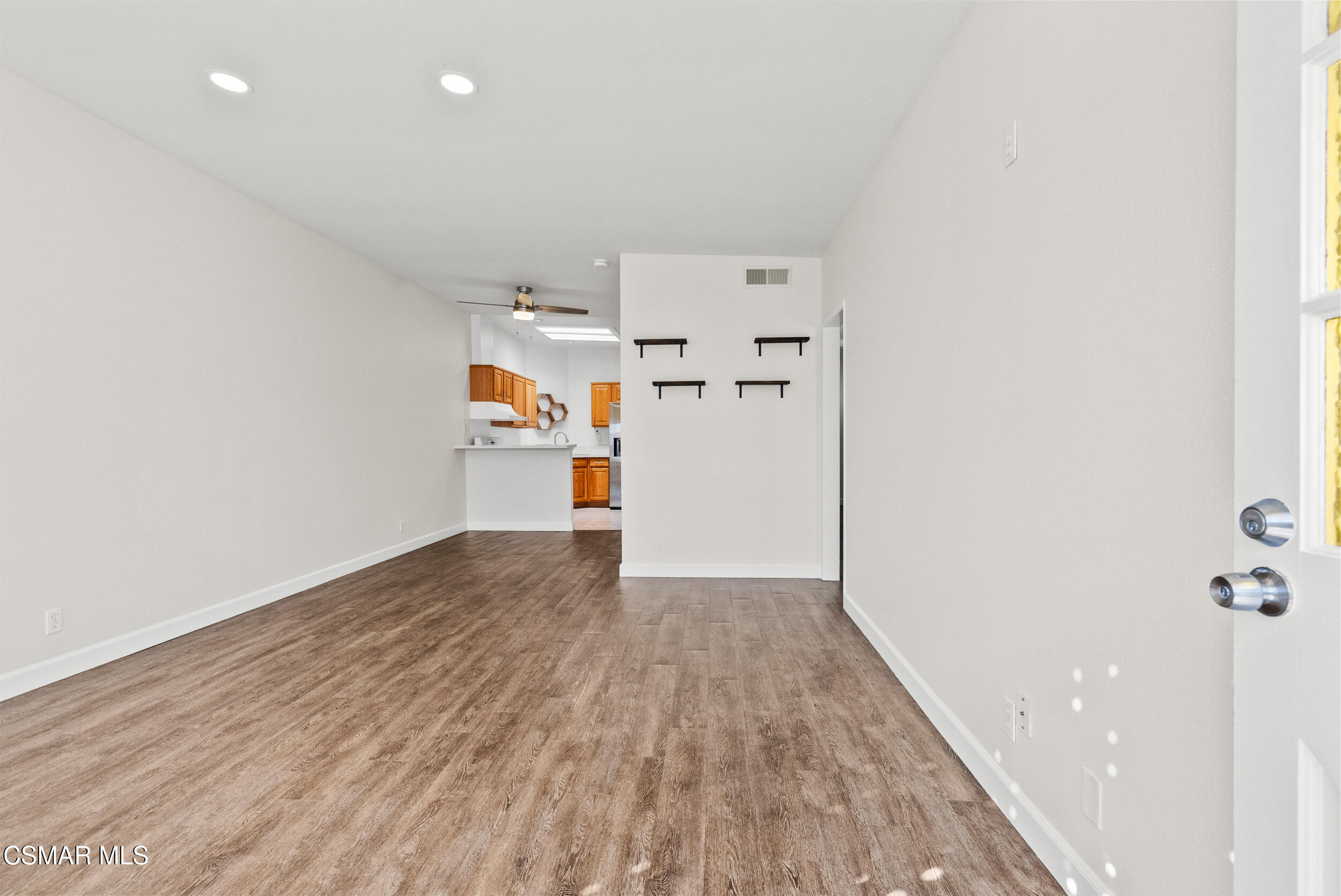 2930 Isle Way, Unit B Oxnard, CA 93035 - Photo 9 of 35 a view of empty room with wooden floor