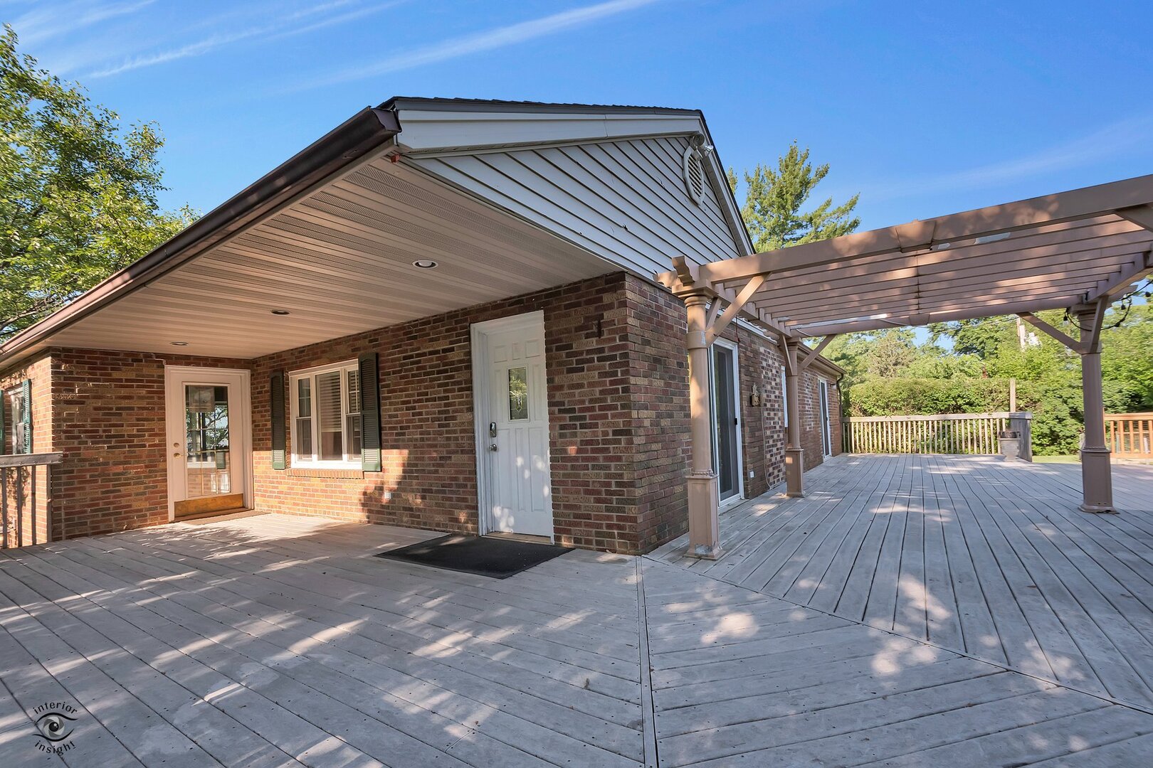 17332 Bluff Road Lemont, IL 60439 - Photo 11 of 18 a front view of a house with a garden