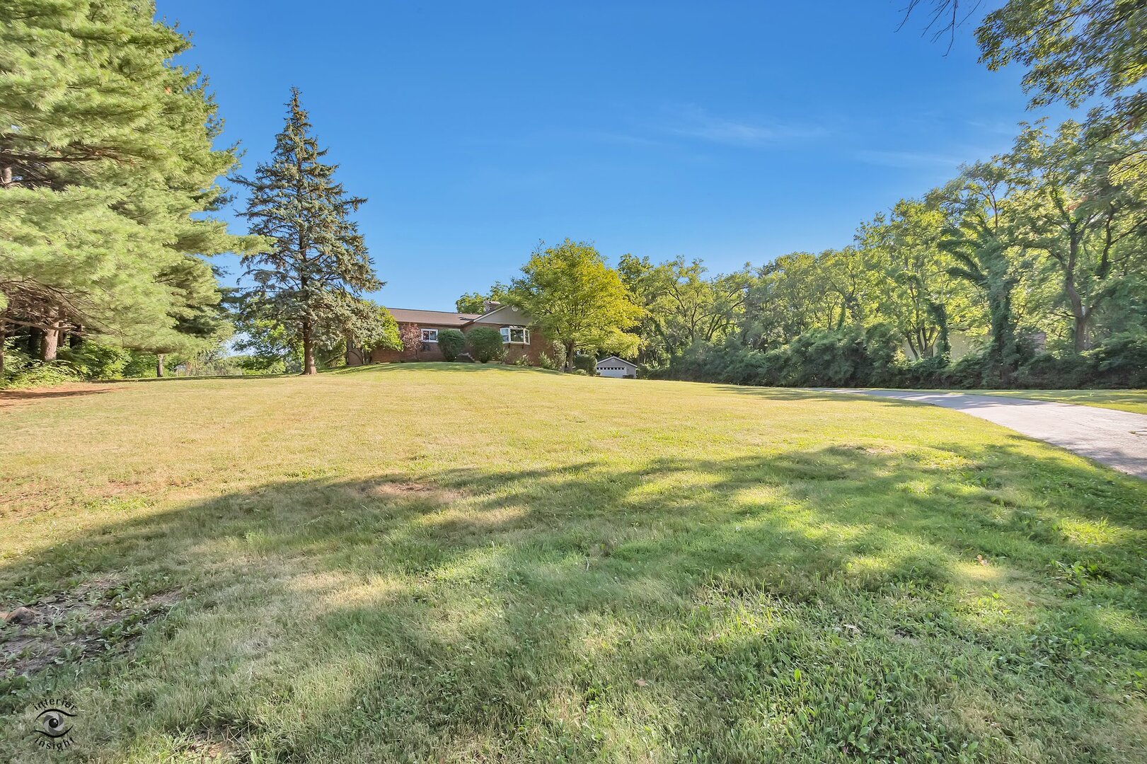 17332 Bluff Road Lemont, IL 60439 - Photo 16 of 18 a view of yard with swimming pool and trees