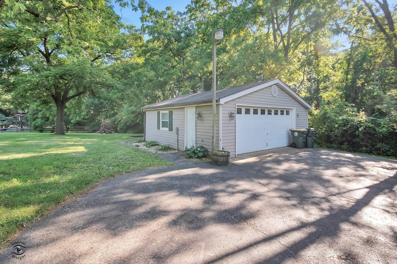 17332 Bluff Road Lemont, IL 60439 - Photo 17 of 18 a view of a house with yard and a garden