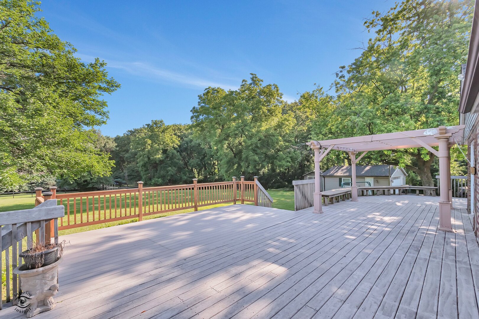 17332 Bluff Road Lemont, IL 60439 - Photo 8 of 18 a view of a roof deck with wooden floor and fence