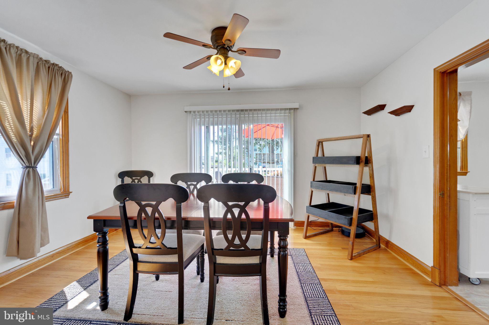 1251 Oakland Terrace Road Halethorpe, MD 21227 - Photo 11 of 34 a view of a dining room with furniture and window