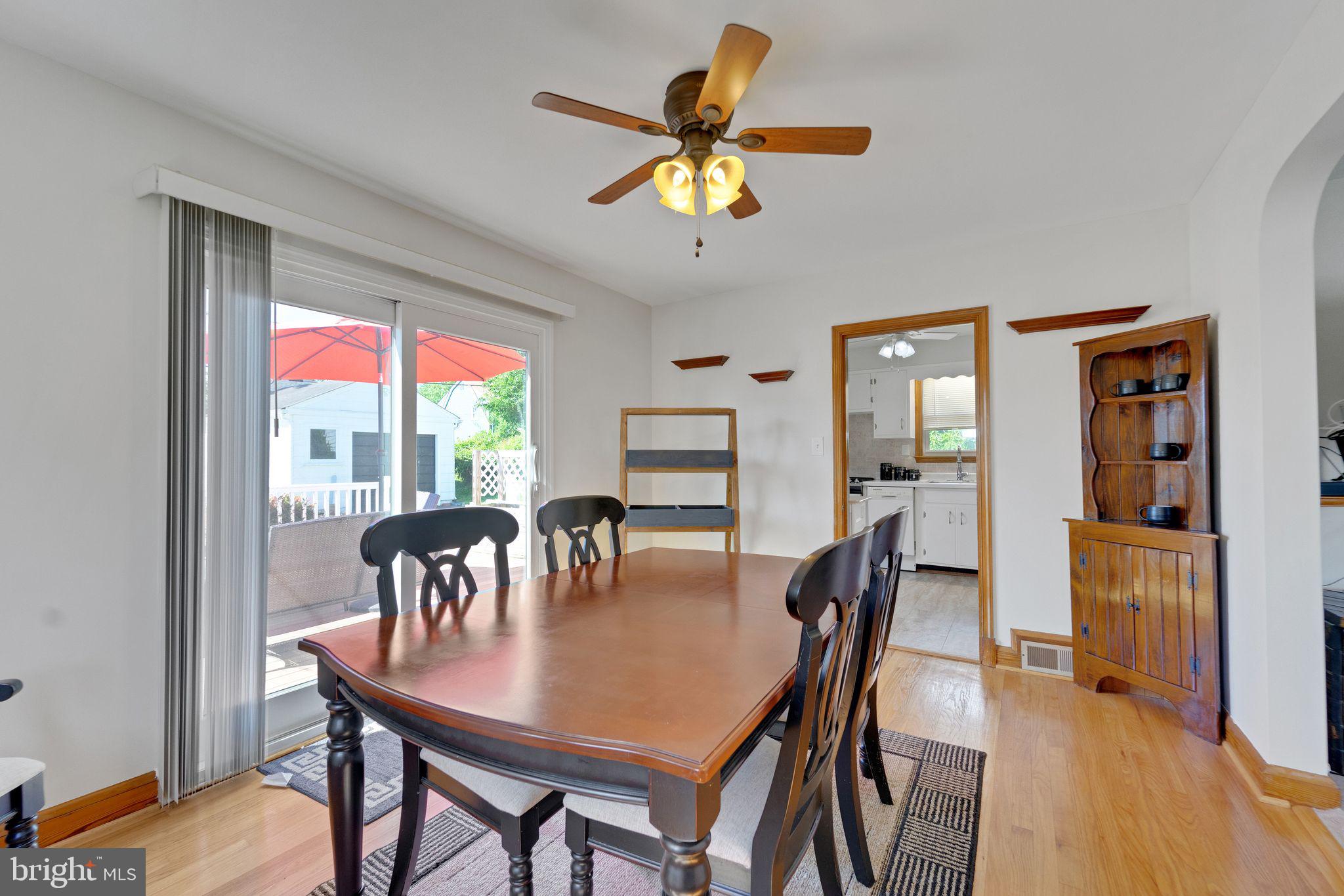 1251 Oakland Terrace Road Halethorpe, MD 21227 - Photo 10 of 34 a view of a dining room with furniture window and wooden floor
