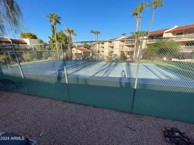 a view of a street with an outdoor space
