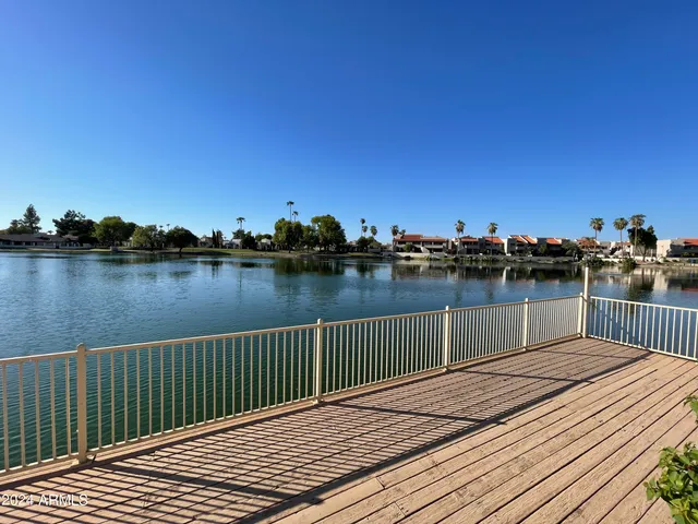 a view of a lake with a outdoor space