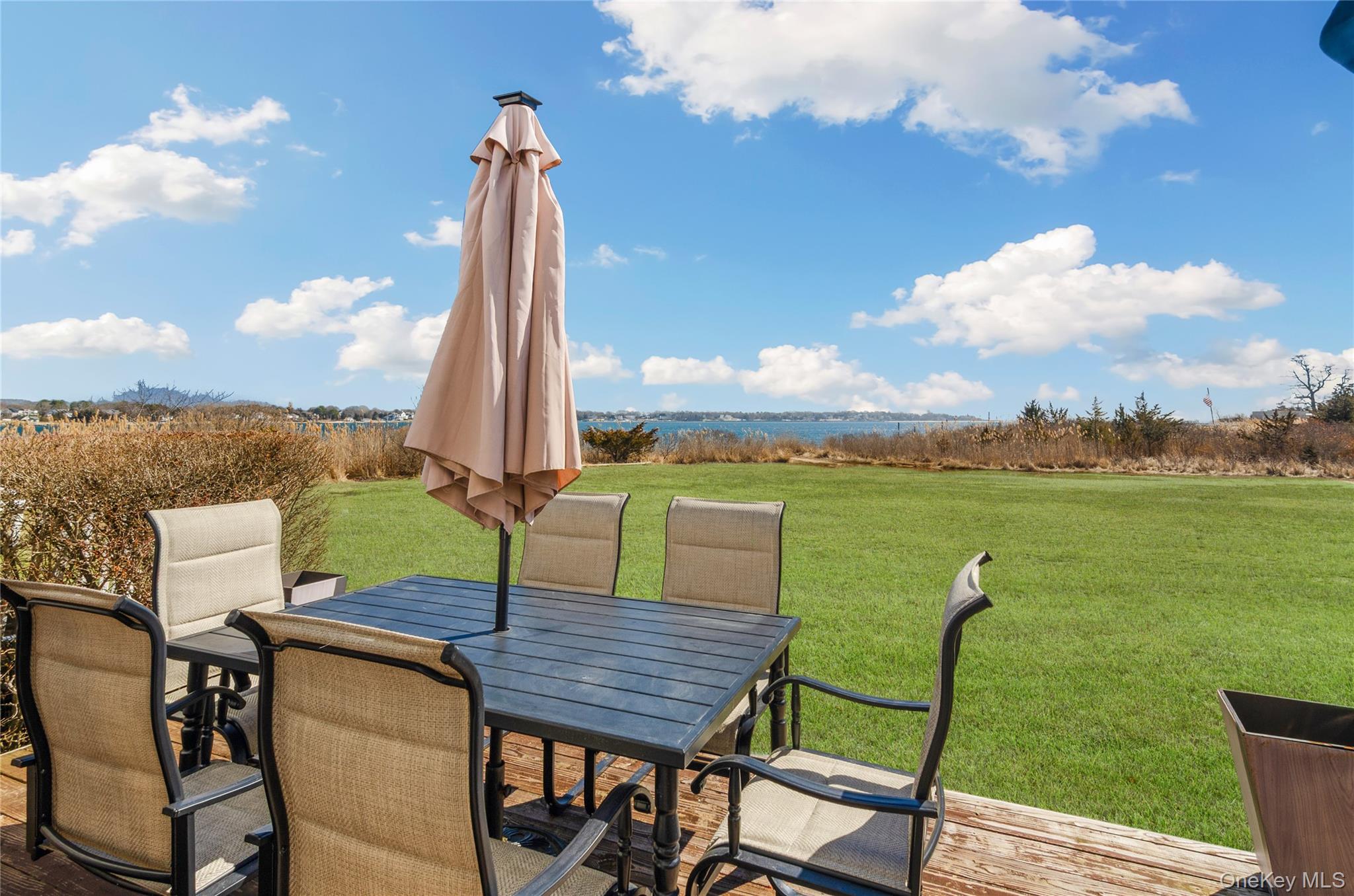 61 West Tiana Road, Unit 10 Hampton Bays, NY 11946 - Photo 14 of 28 South facing with view of the Bay