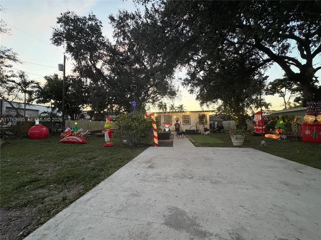 a view of street with parked cars