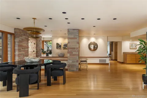 a kitchen with stainless steel appliances granite countertop cabinets and wooden floor