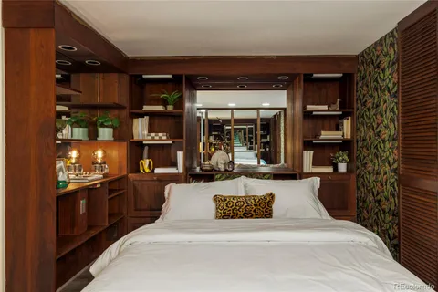 a front view of a building with sitting area