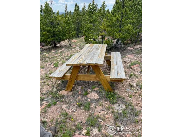 a view of a yard covered in snow