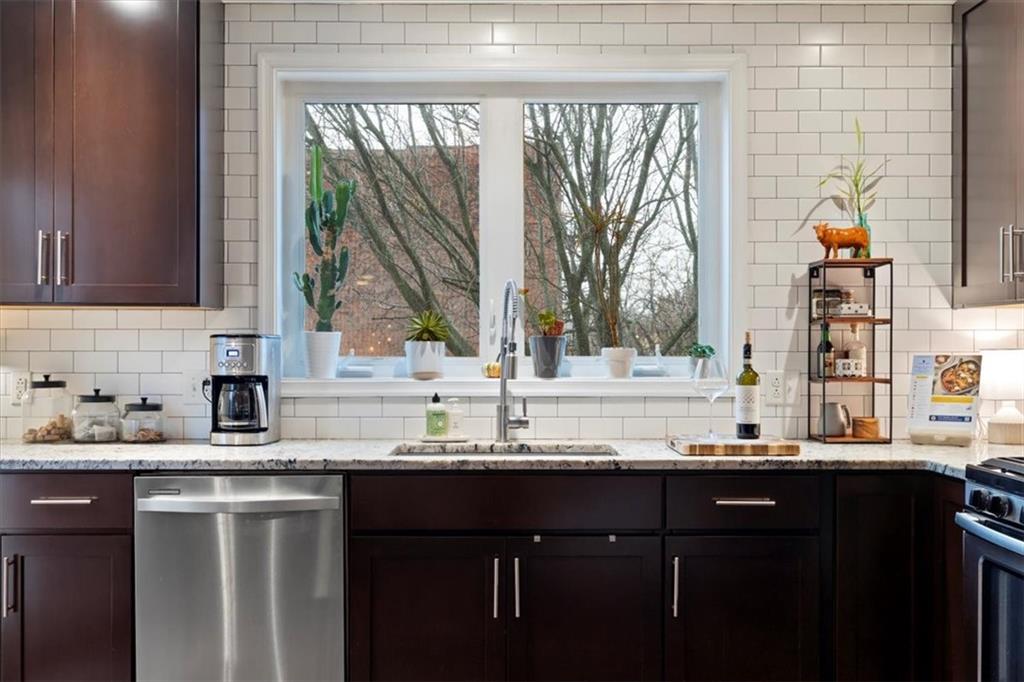1507 Federal Street Pittsburgh, PA 15212 - Photo 16 of 45 a kitchen with granite countertop a sink and a window