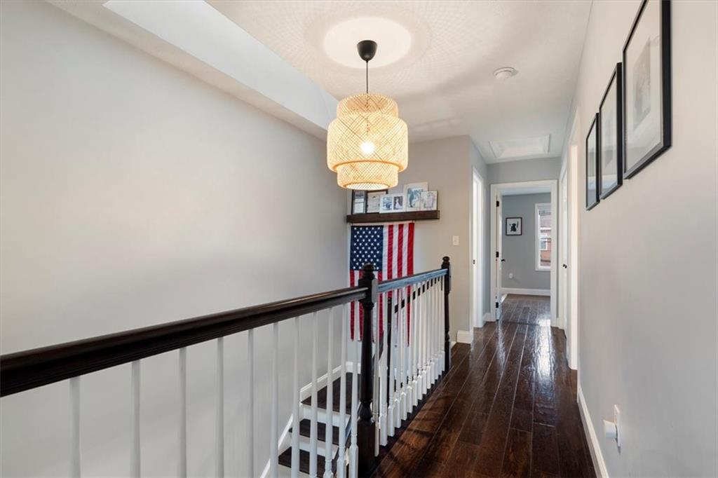 1507 Federal Street Pittsburgh, PA 15212 - Photo 20 of 45 a view of a hallway with wooden floor and staircase