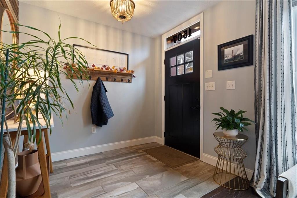 1507 Federal Street Pittsburgh, PA 15212 - Photo 2 of 45 a view of a hallway with paintings on the wall