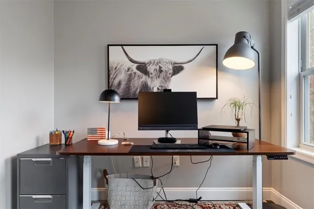 a table room with furniture and lamp