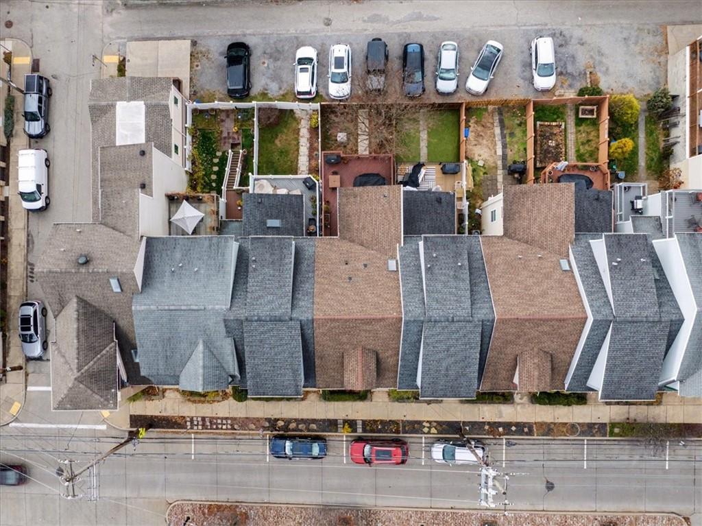 1507 Federal Street Pittsburgh, PA 15212 - Photo 32 of 45 a living room with furniture and a floor to ceiling window