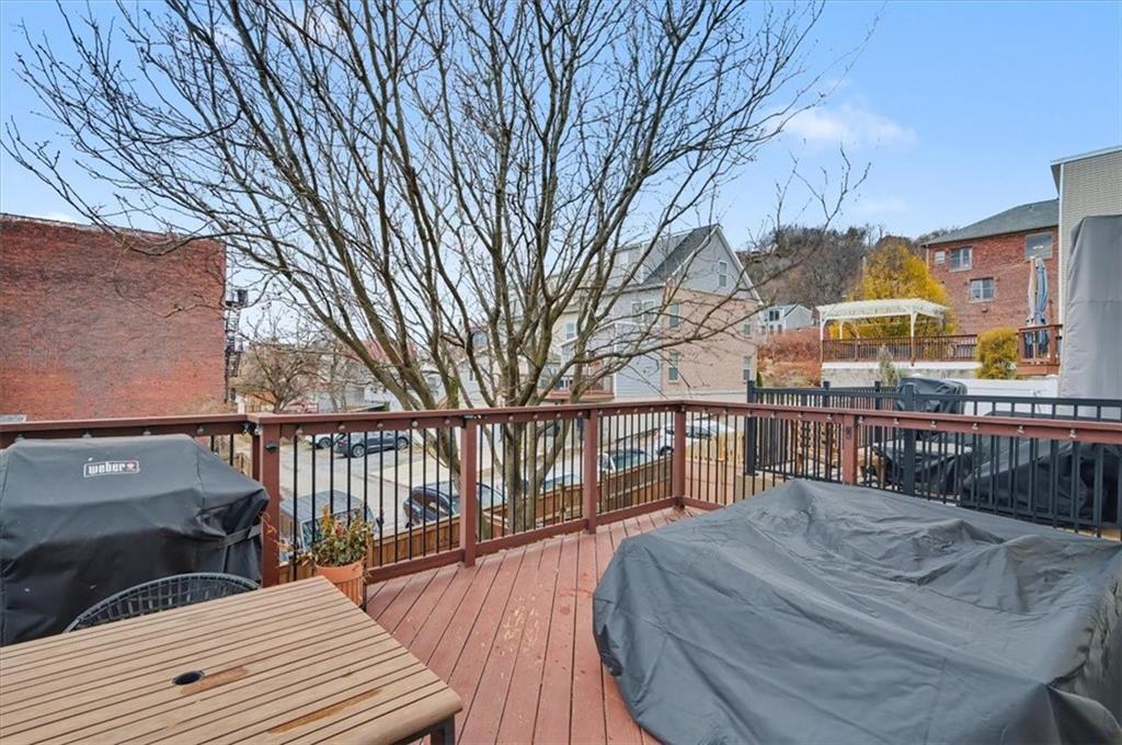 1507 Federal Street Pittsburgh, PA 15212 - Photo 37 of 45 a view of a house with wooden deck