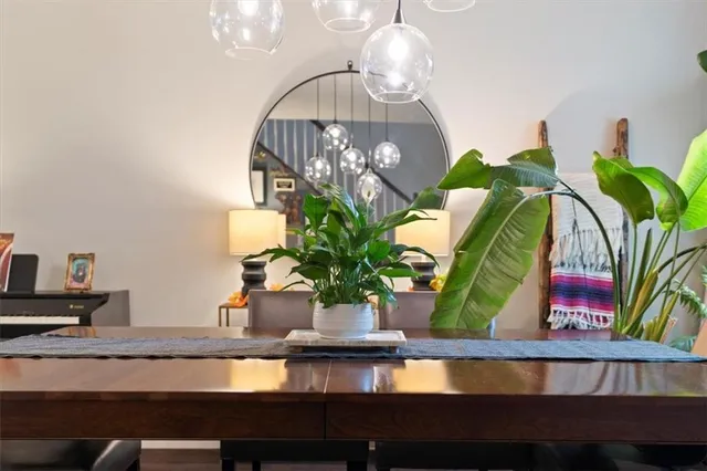 a view of a vase of flowers sitting on a table
