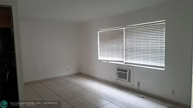 a view of a room that has a window in it