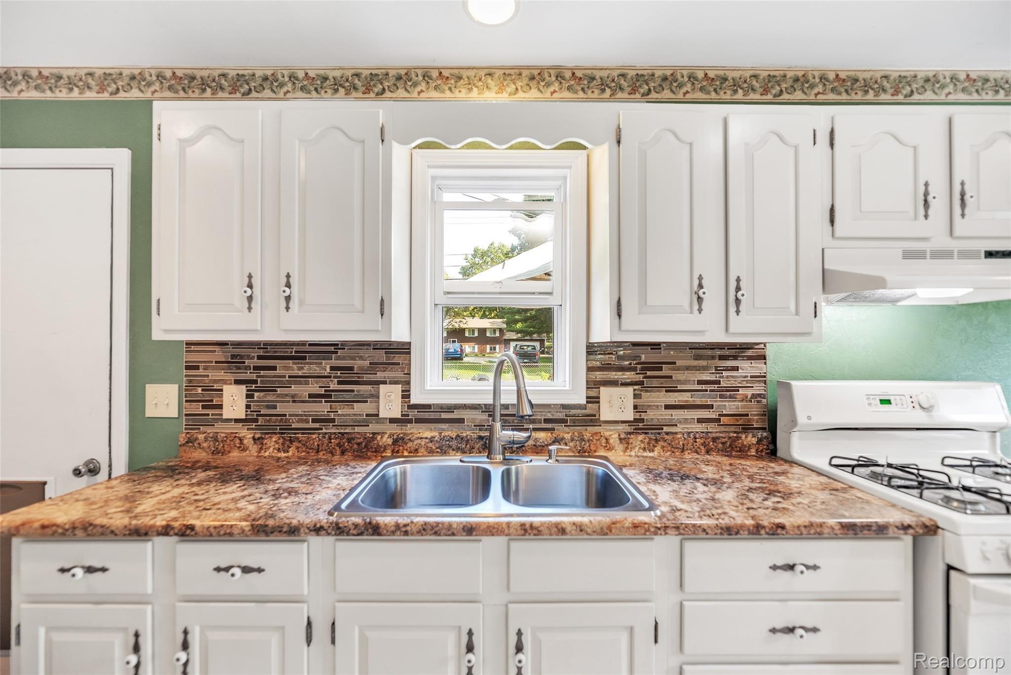 1374 Butler Boulevard Howell, MI 48843 - Photo 16 of 41 20-1374-Butler-Blvd-WindowStill-Rea.jpg