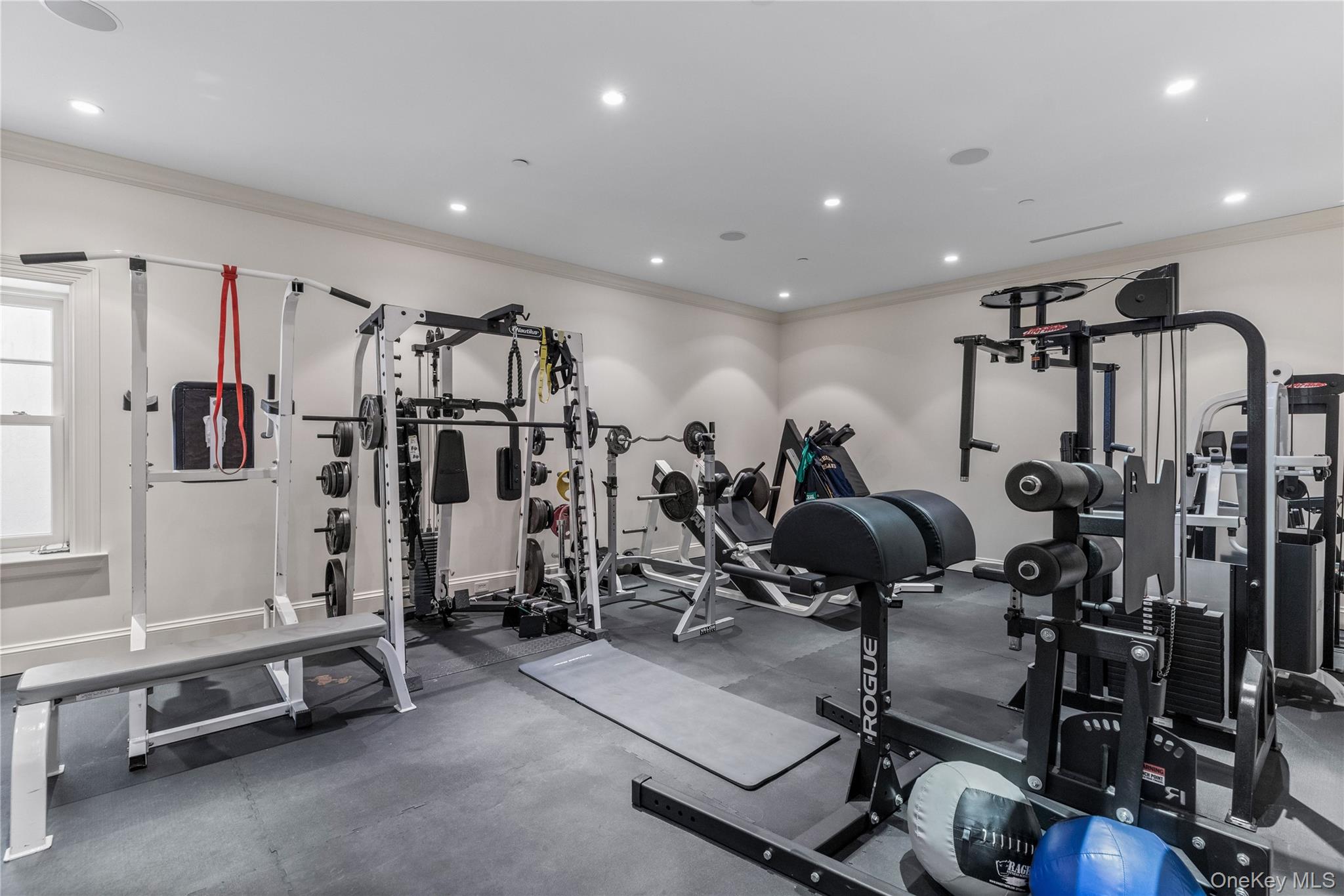 75 Cove Neck Road Cove Neck, NY 11771 - Photo 30 of 40 a view of a room with gym equipment
