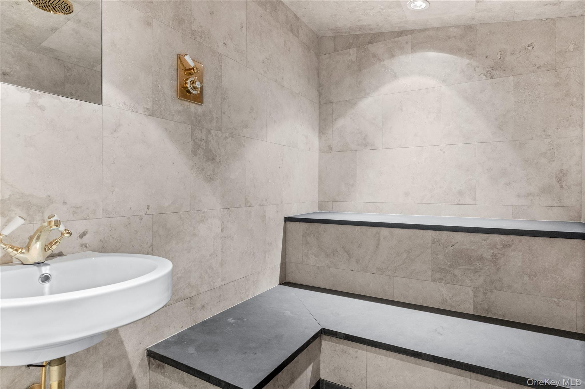 75 Cove Neck Road Cove Neck, NY 11771 - Photo 31 of 40 a bathroom with a bathtub