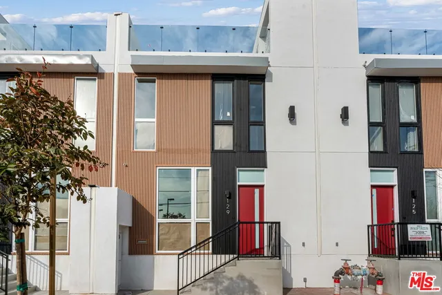 a view of city with tall buildings