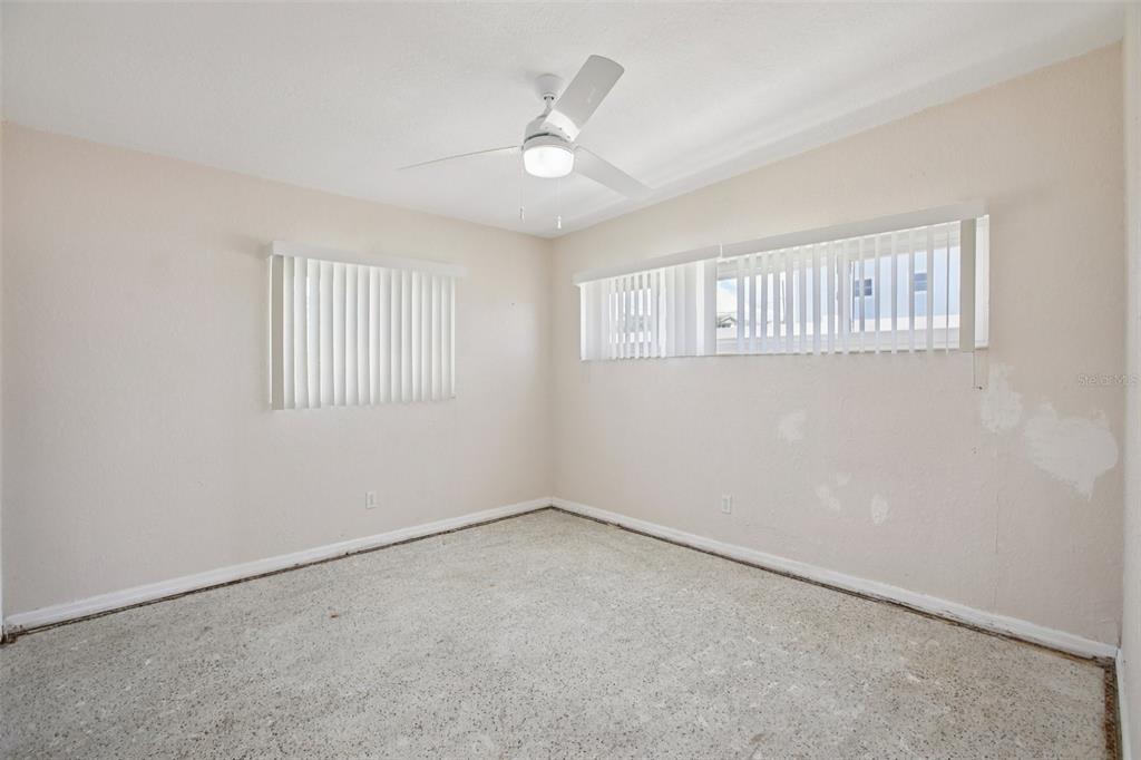 16016 4th Street East Redington Beach, FL 33708 - Photo 15 of 29 an empty room with windows