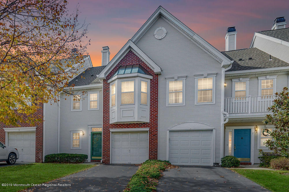 8 Bristel Road Holmdel, NJ 07733 - Photo 1 of 30 a front view of a house with a yard and garage