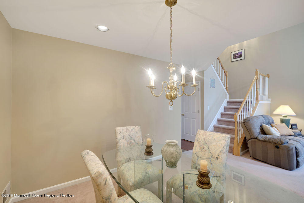 8 Bristel Road Holmdel, NJ 07733 - Photo 8 of 30 a view of a dining room with furniture