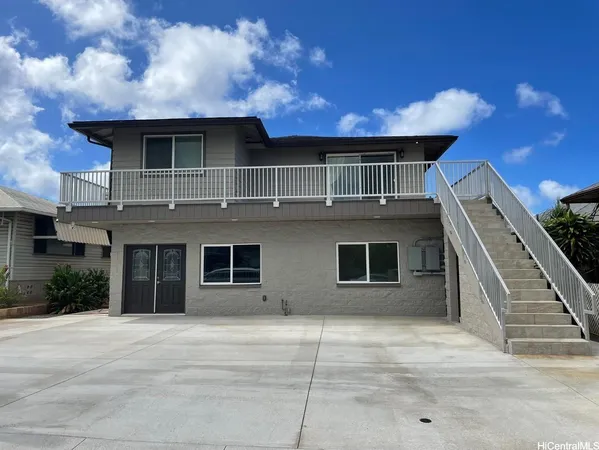 a front view of a house with a garage