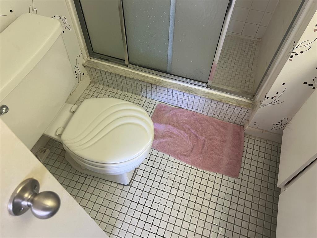 10100 Northwest 30th Court, Unit 310 Sunrise, FL 33322 - Photo 36 of 60 a bathroom with a toilet