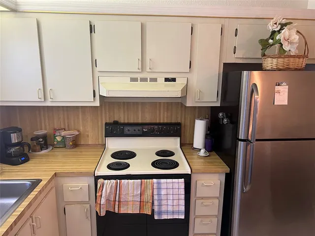 a view of a living room with furniture and a couch