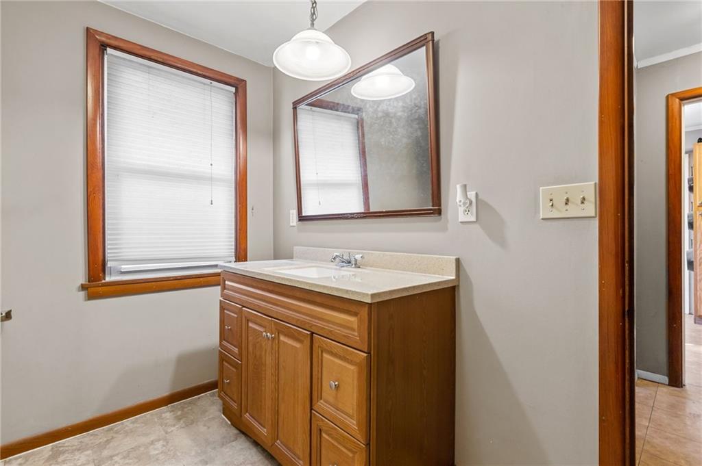 745 Park Quarry Road Freedom, PA 15042 - Photo 14 of 22 a bathroom with a sink and a mirror