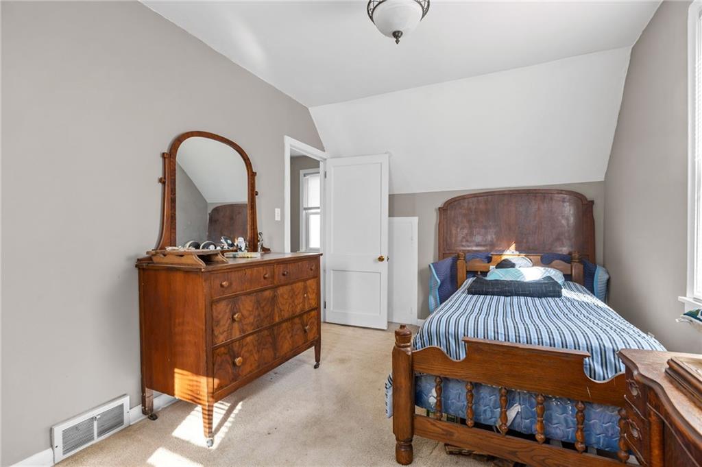 745 Park Quarry Road Freedom, PA 15042 - Photo 16 of 22 a bedroom with a bed and a dresser