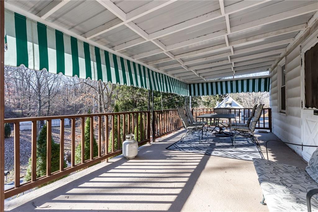 745 Park Quarry Road Freedom, PA 15042 - Photo 3 of 22 a view of a patio with wooden floor
