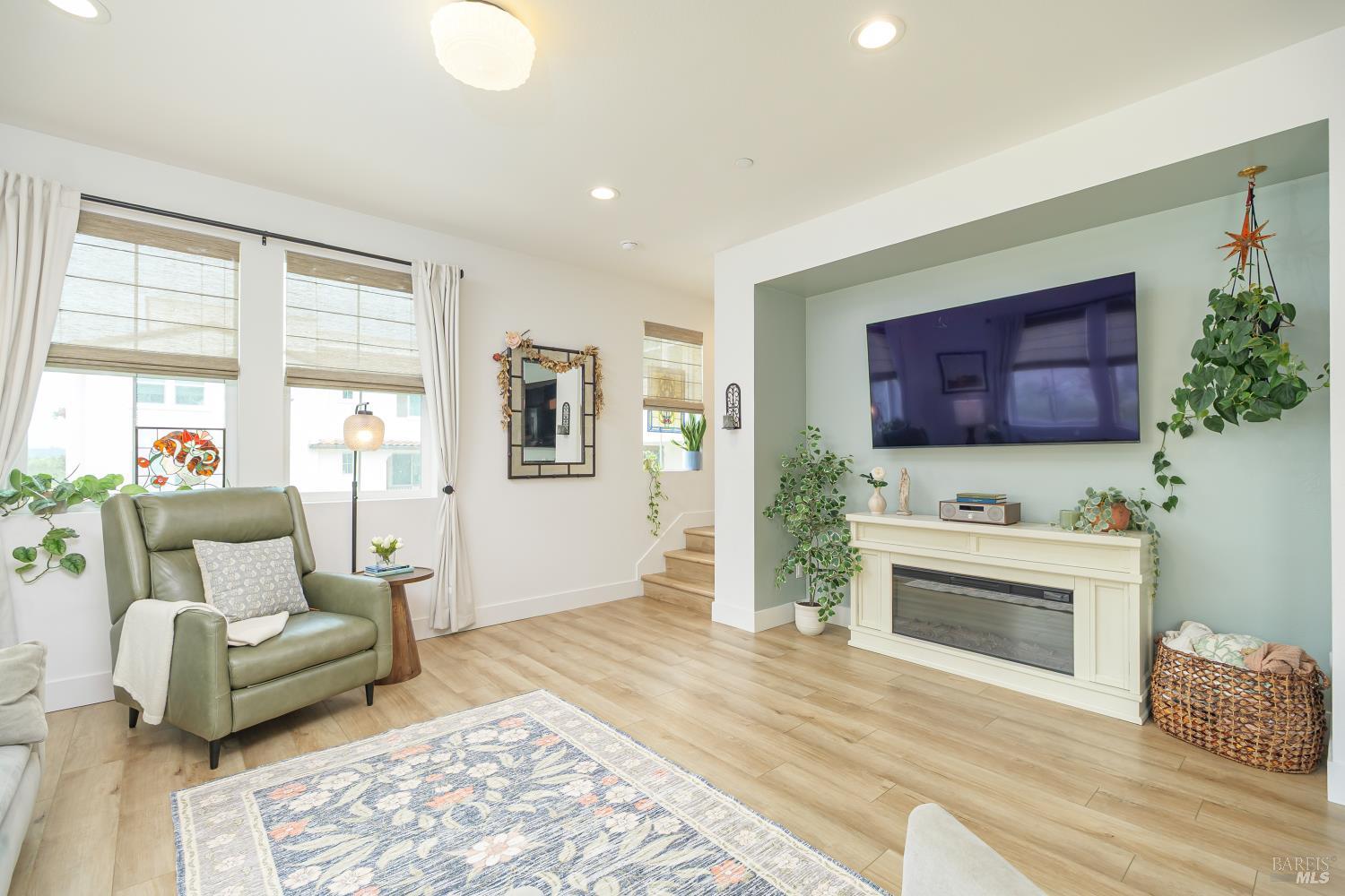 715 Rockview Road Novato, CA 94949 - Photo 7 of 35 Living room entertainment space with stair access to 3rd level.