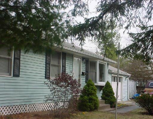 39 Mountain View Road Ansonia, CT 06401 - Photo 1 of 1 a front view of a house with a tree